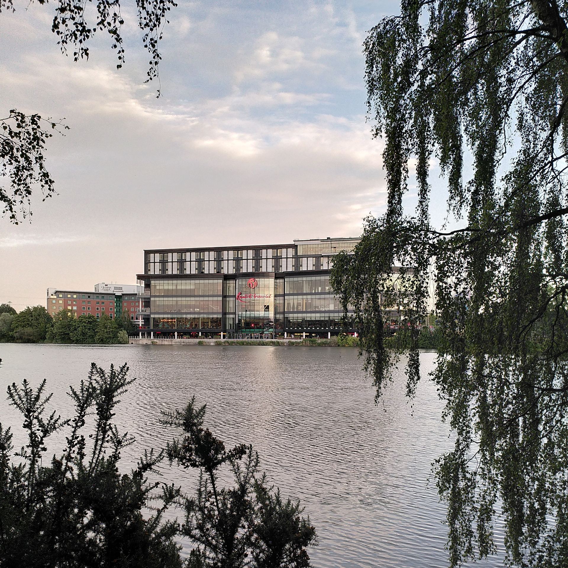 Resorts World Birmingham, home to Genting Hotel and Genting Casino, viewed across Pendigo Lake